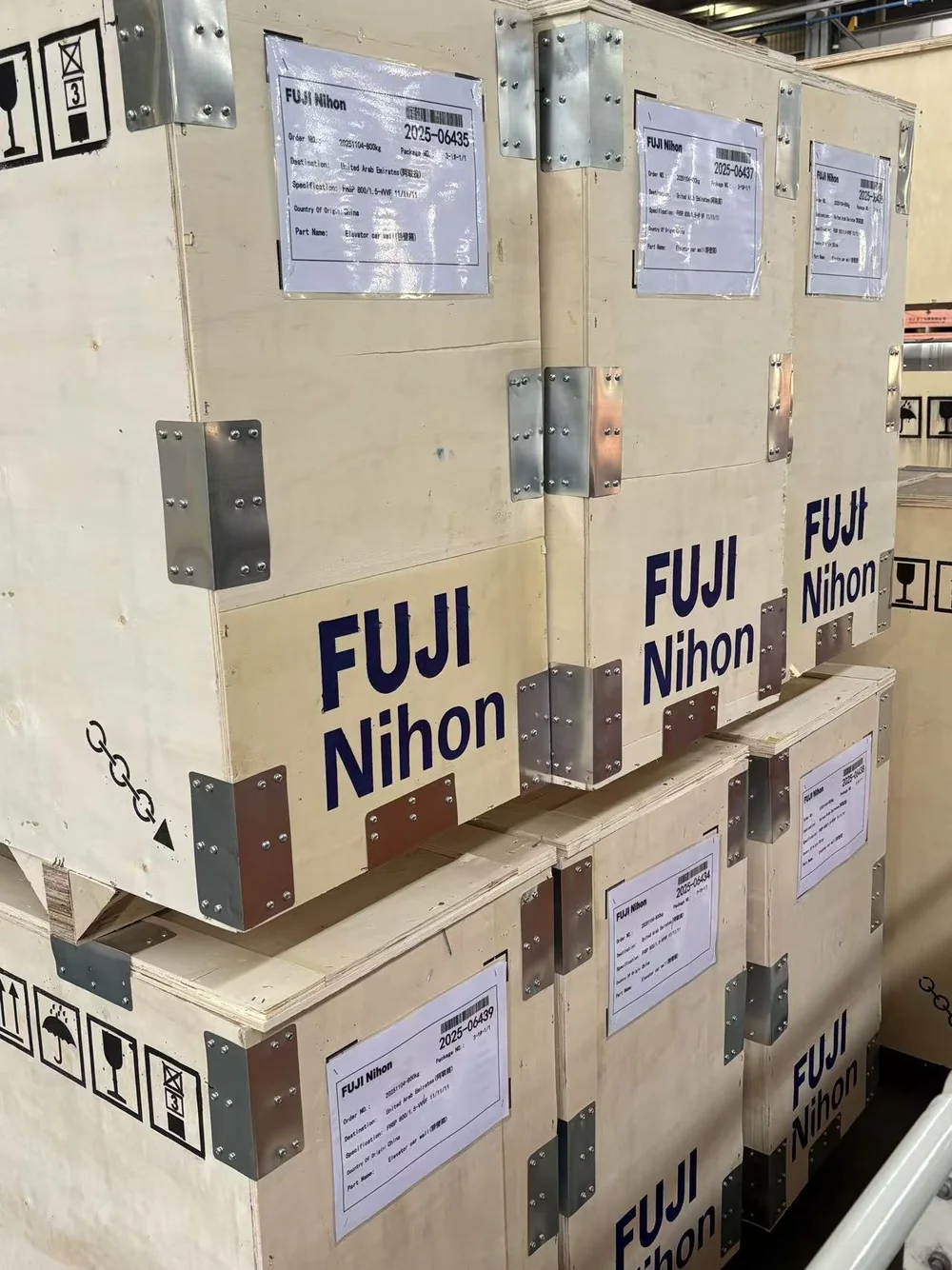 FUJI Nihon-branded reinforced wooden export cases prepared for shipment